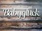 Preview: Schriftzug Babyglück aus Holz in weiß