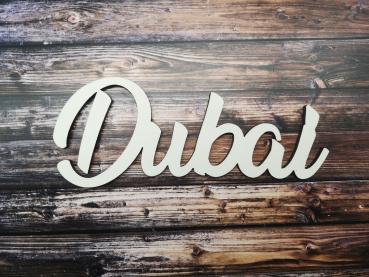 Schriftzug Stadtname Dubai aus Holz in weiß